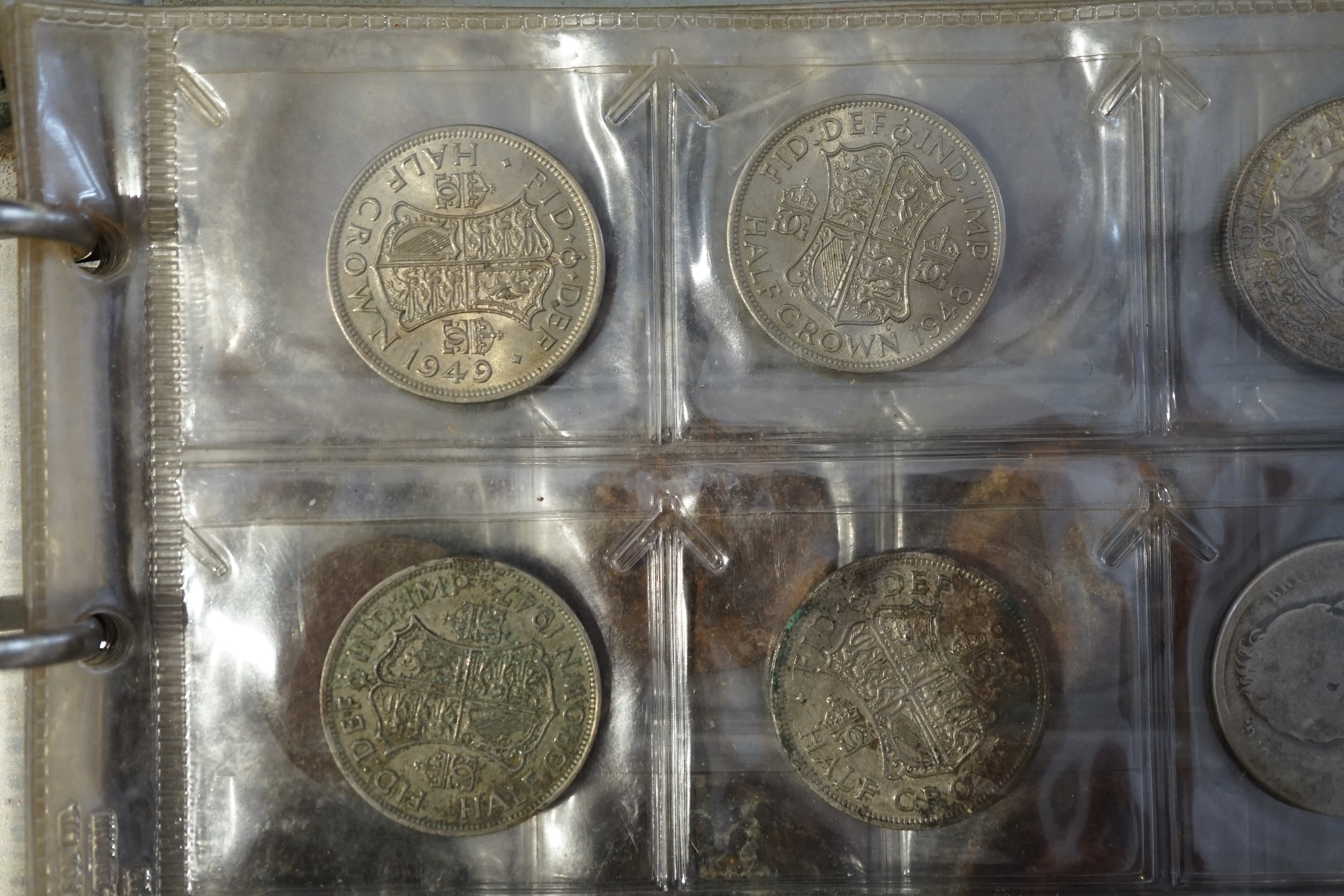 British and World coins, in an album and loose, together with banknotes, highlights include George V halfcrown 1923, about EF, and various pre-1947 silver coins